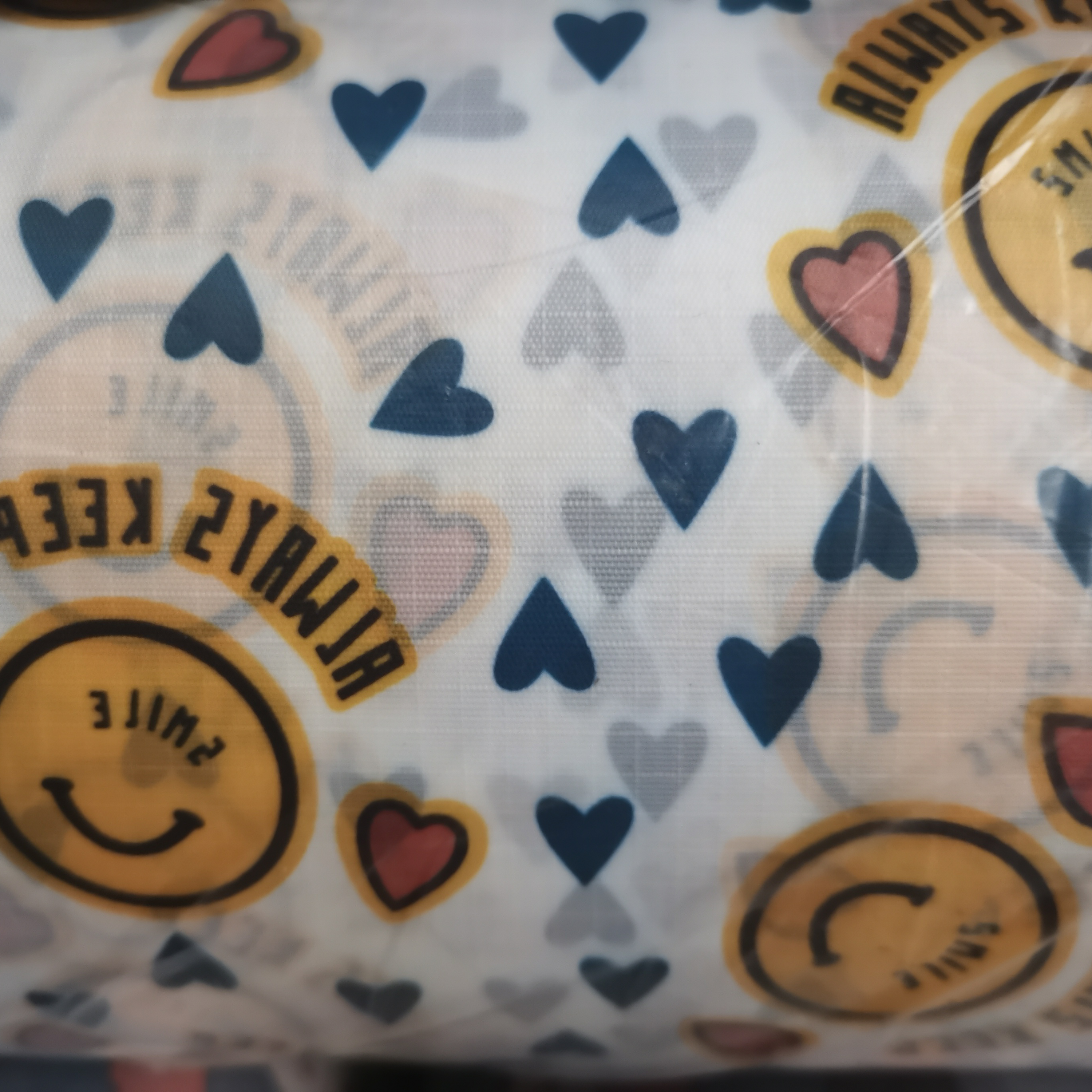 Yellow smiling face in checkered pattern