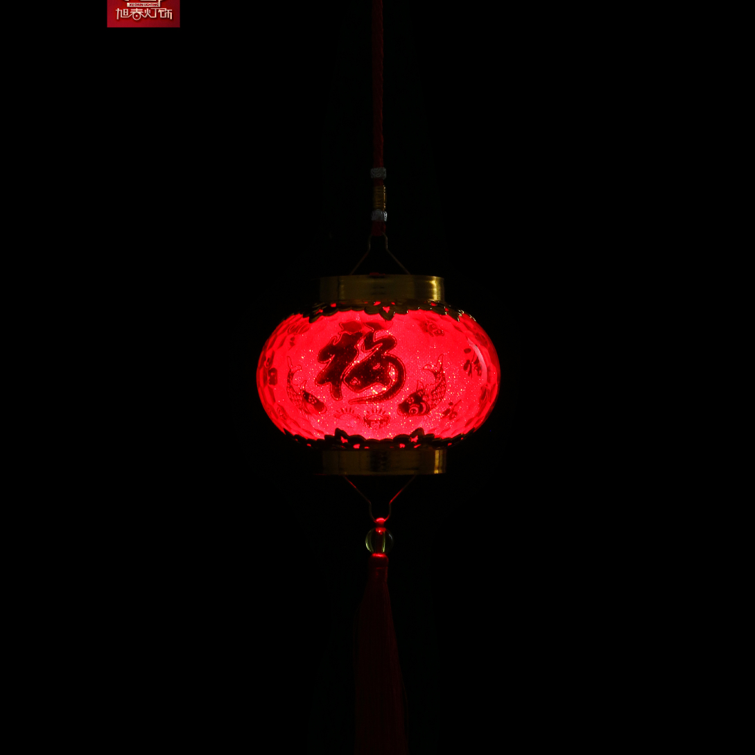 Crystal laser small lanterns are hung on the tree as New Year decorations. Big red outdoor bonsai are used for indoor decoration during the Spring Festival thumbnail