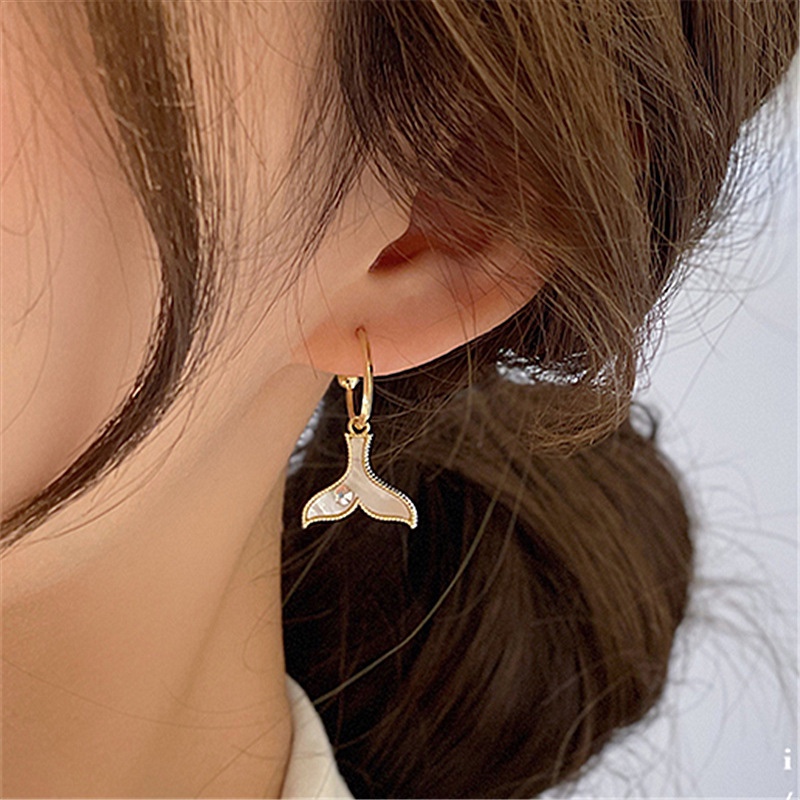 Mermaid tail delicate ear buckle, sparkly.