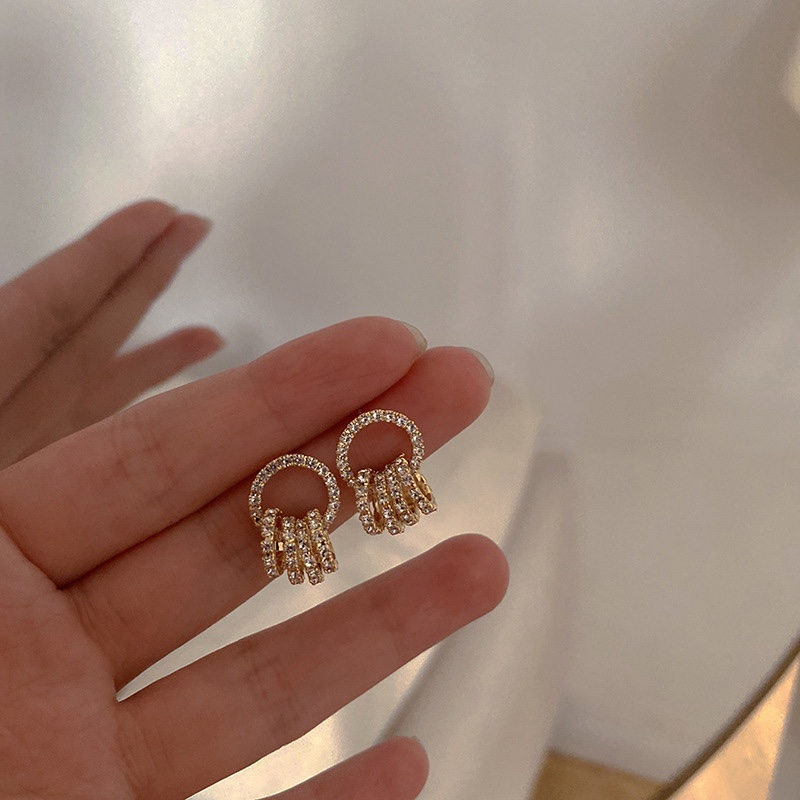 Metal multiple hoop earrings, beautiful and bright. thumbnail