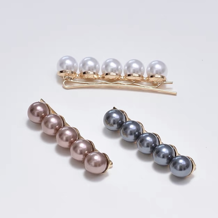 Four pearls color a word