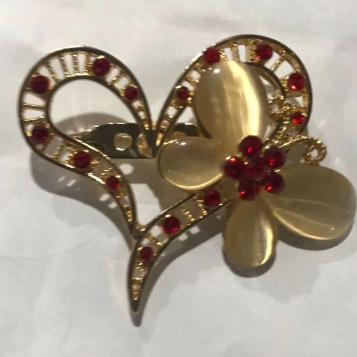 Butterfly heart brooch