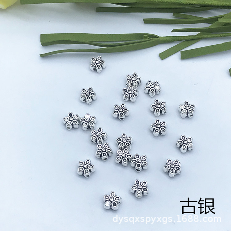 Alloy plum blossom beads Specification image