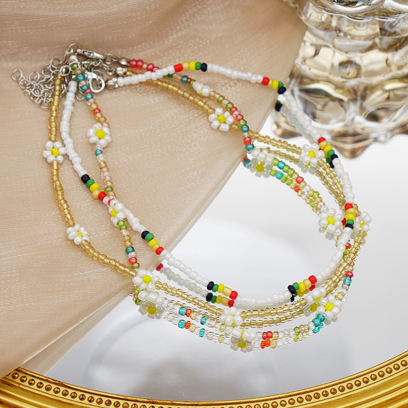 The color of the small flowers on the handmade rice bead necklace can be customized Specification image