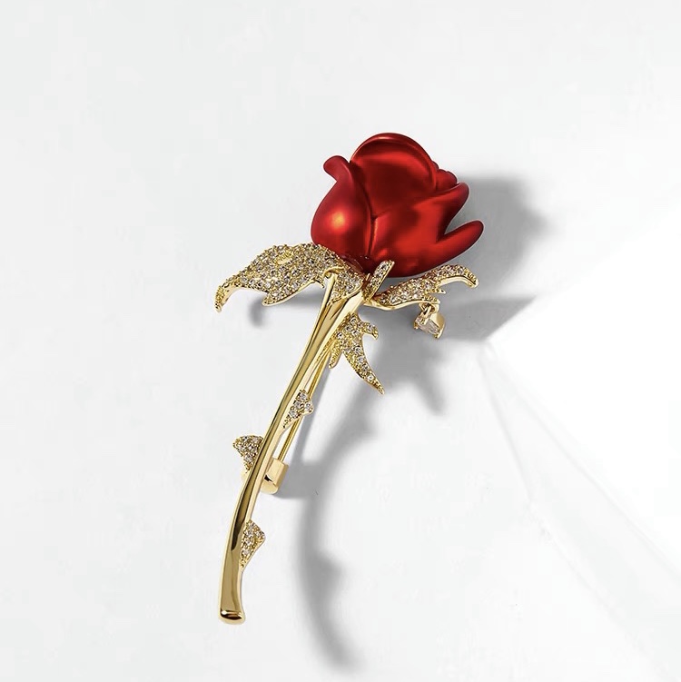 Gold rose brooch