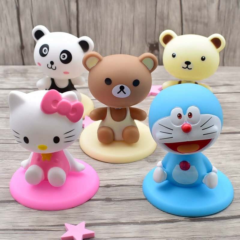 A Variety Of Bobblehead Figures Randomly Mixed