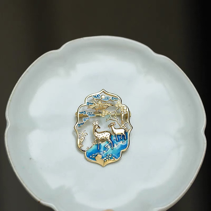 Mountain deer brooch