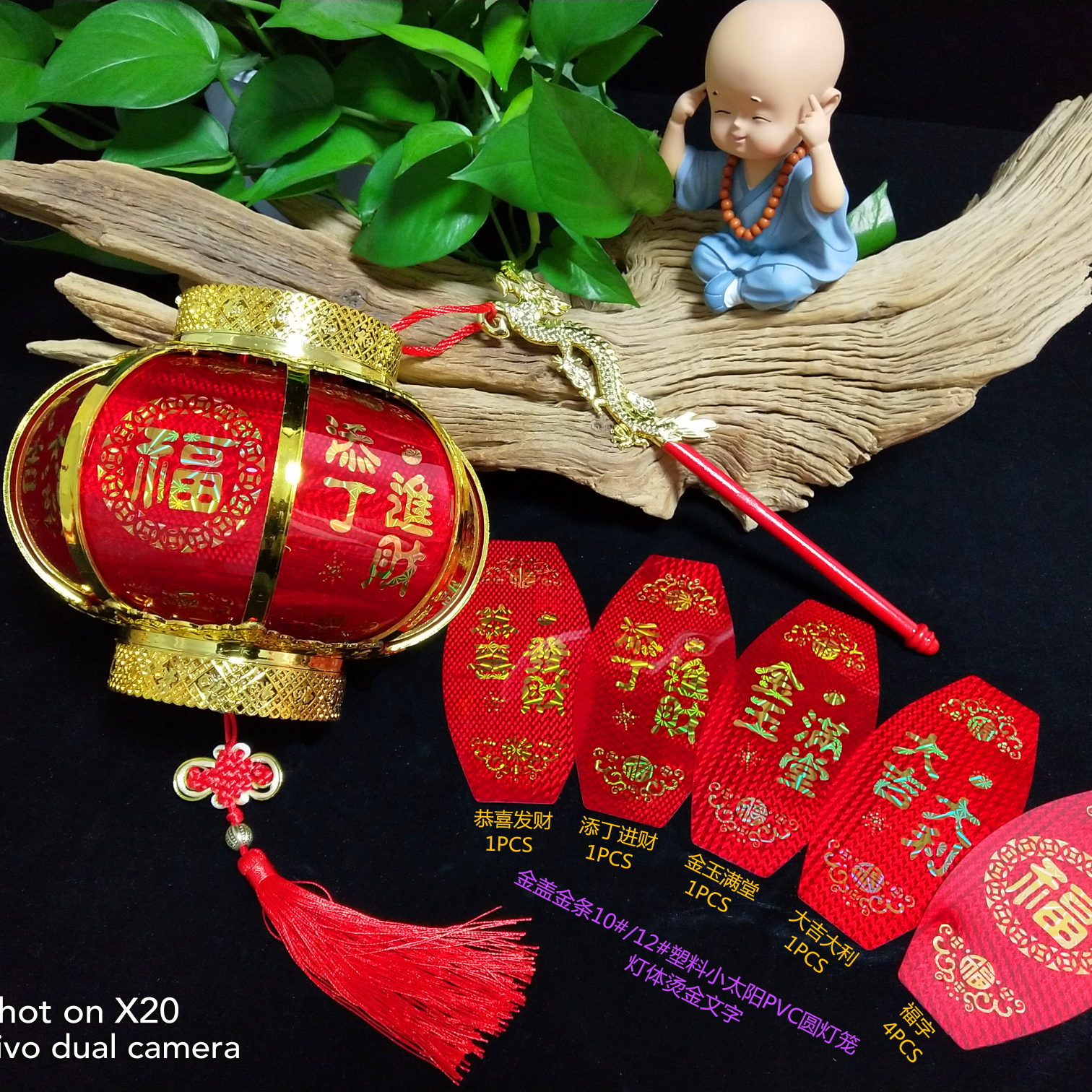 Children wearing Hanfu and holding palace lanterns are shining. Stage decoration for the 2021 Lantern Festival: Children carrying lanterns full figure