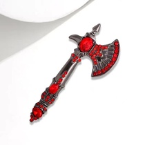 Red ax brooch is a must this year