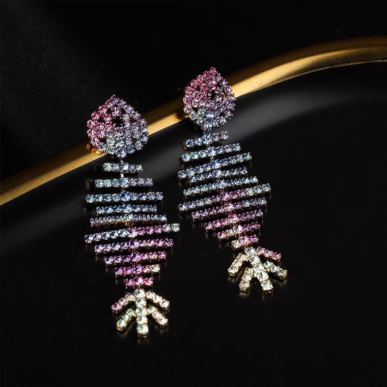 Fish bones full of small zirconium earrings