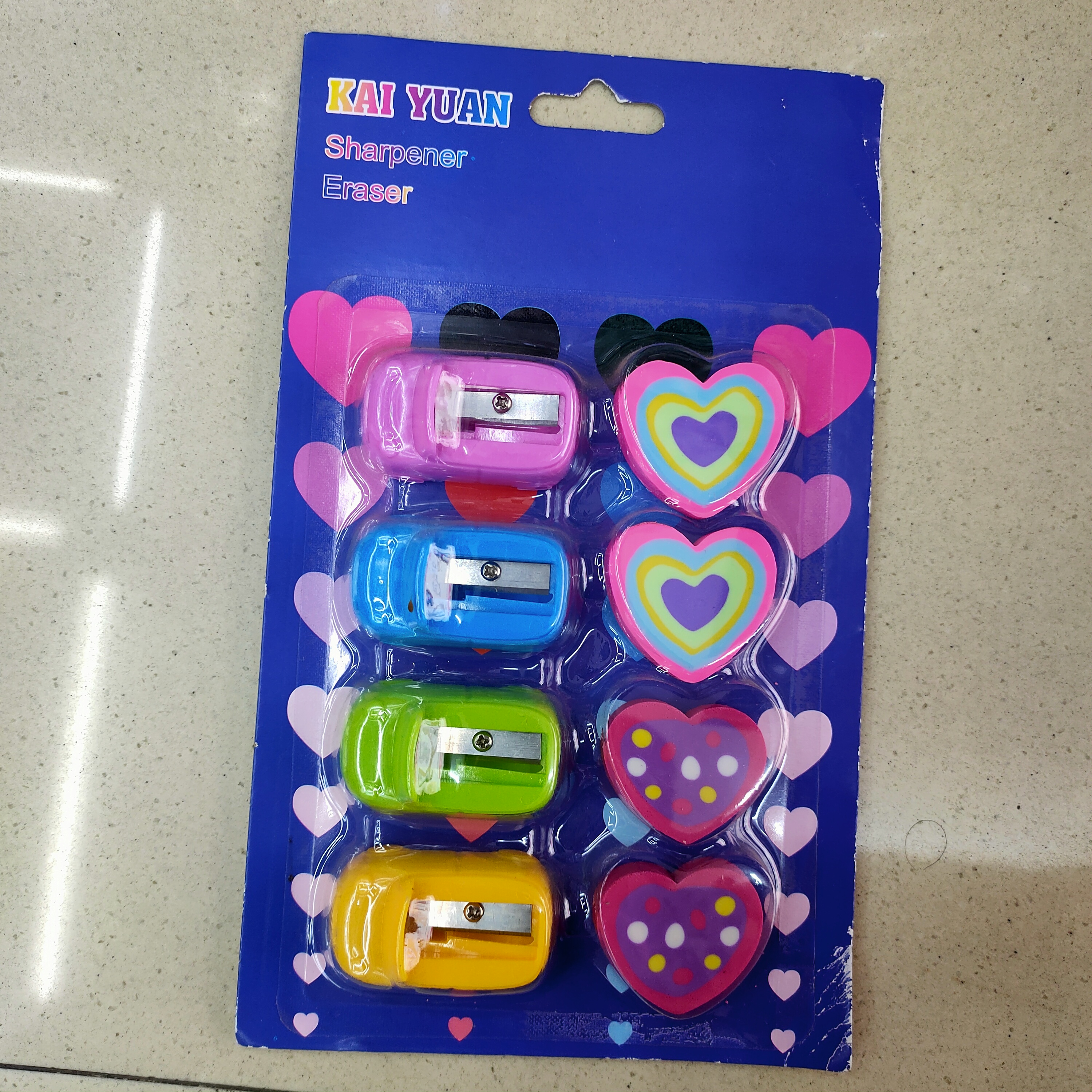 4 heart-shaped erasers + pencil sharpener suction cards