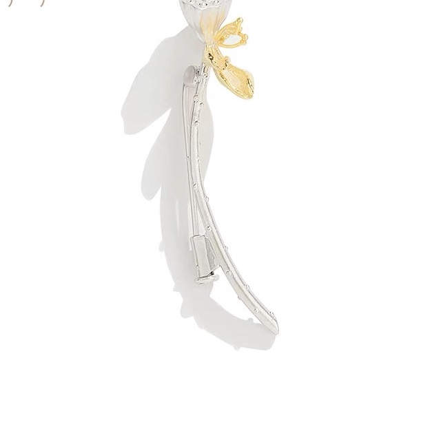 Monogram brooch