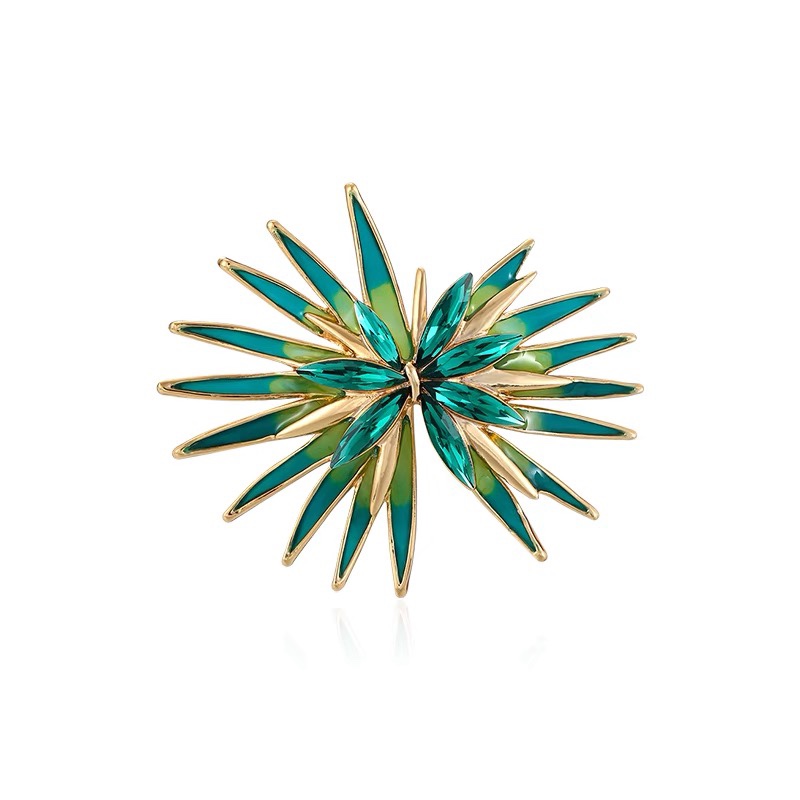 Asymmetrical star brooch