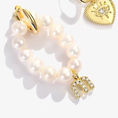 What small pearl heart earrings
