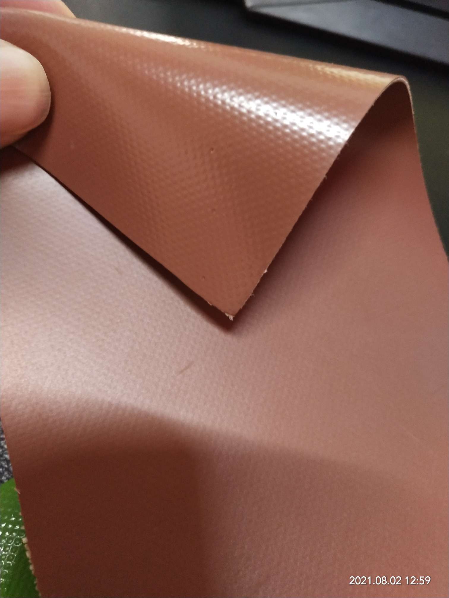 High-quality matte coffee-colored PVC mesh fabric for luggage is suitable for various types of roller shutters, tool bags and special fabric for bags detail image 1