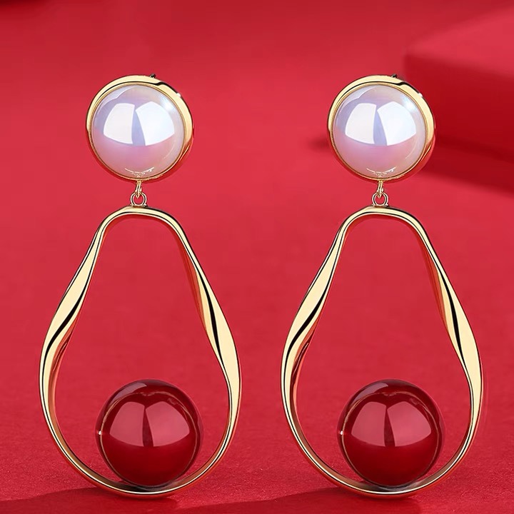Temperament drop hollow imitation pearl earrings