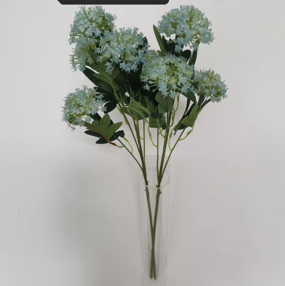 Five emerald blue beads