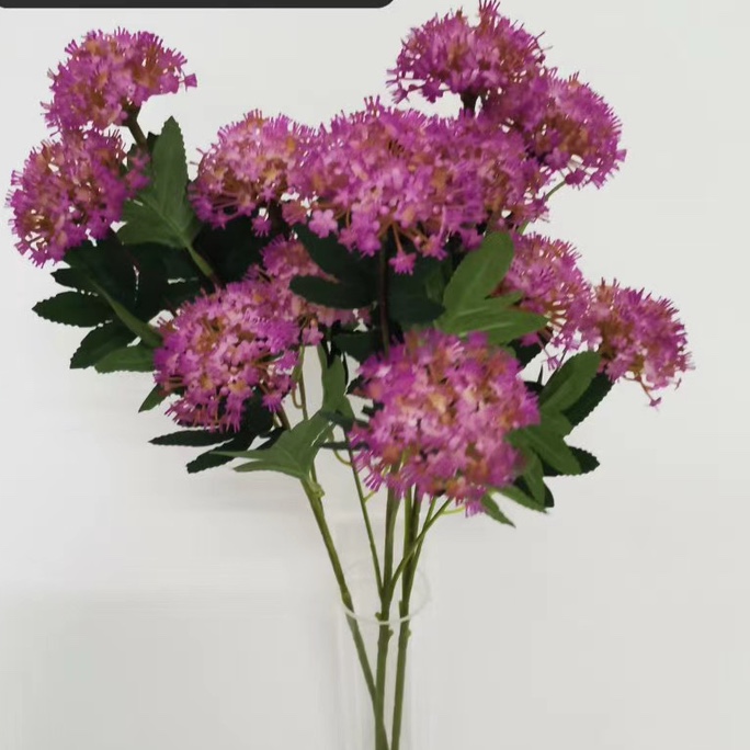 Five heads of green pearls in rose red