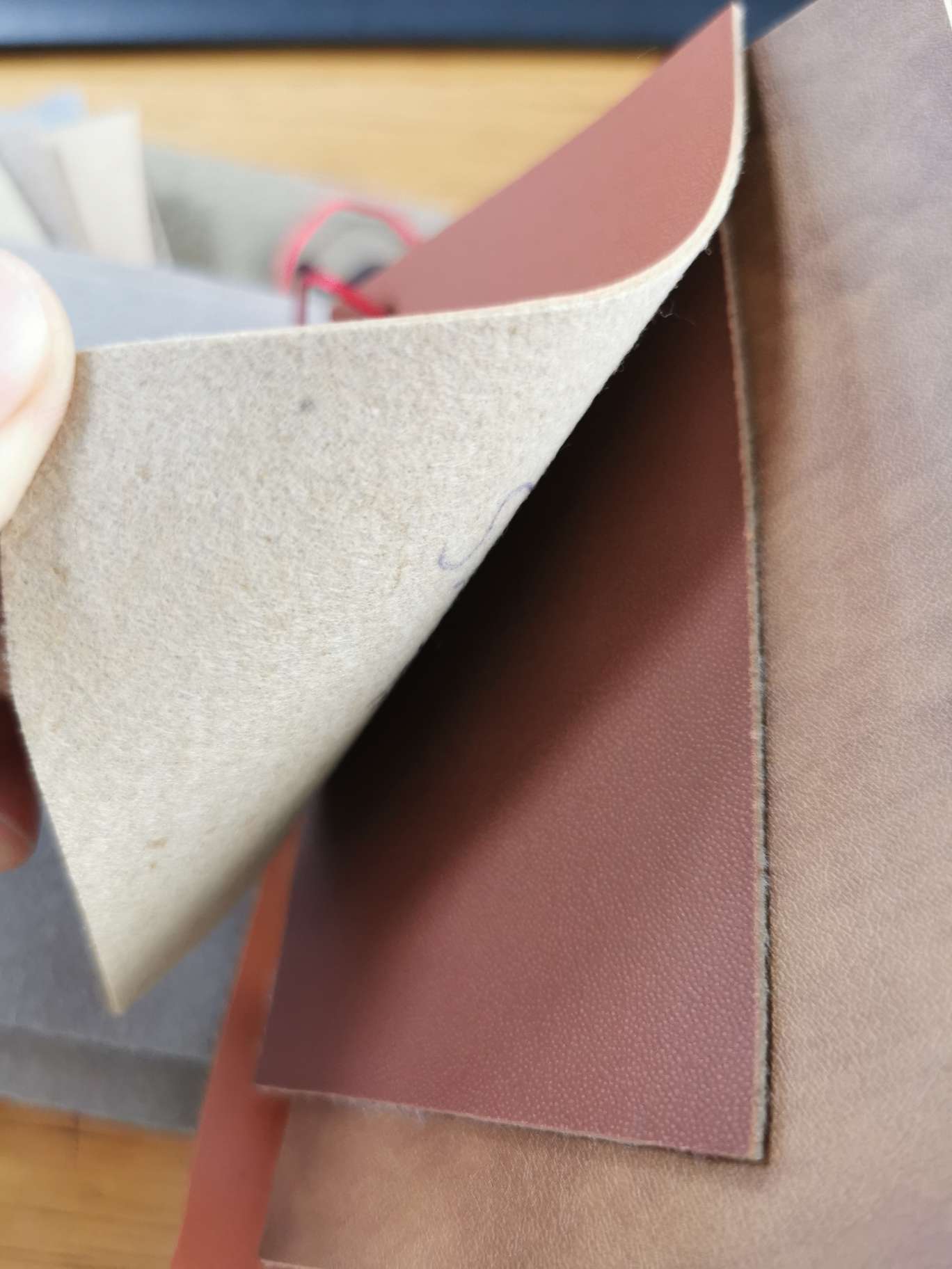 Space leather pinhole pressed modified leather trademark leather detail image 1
