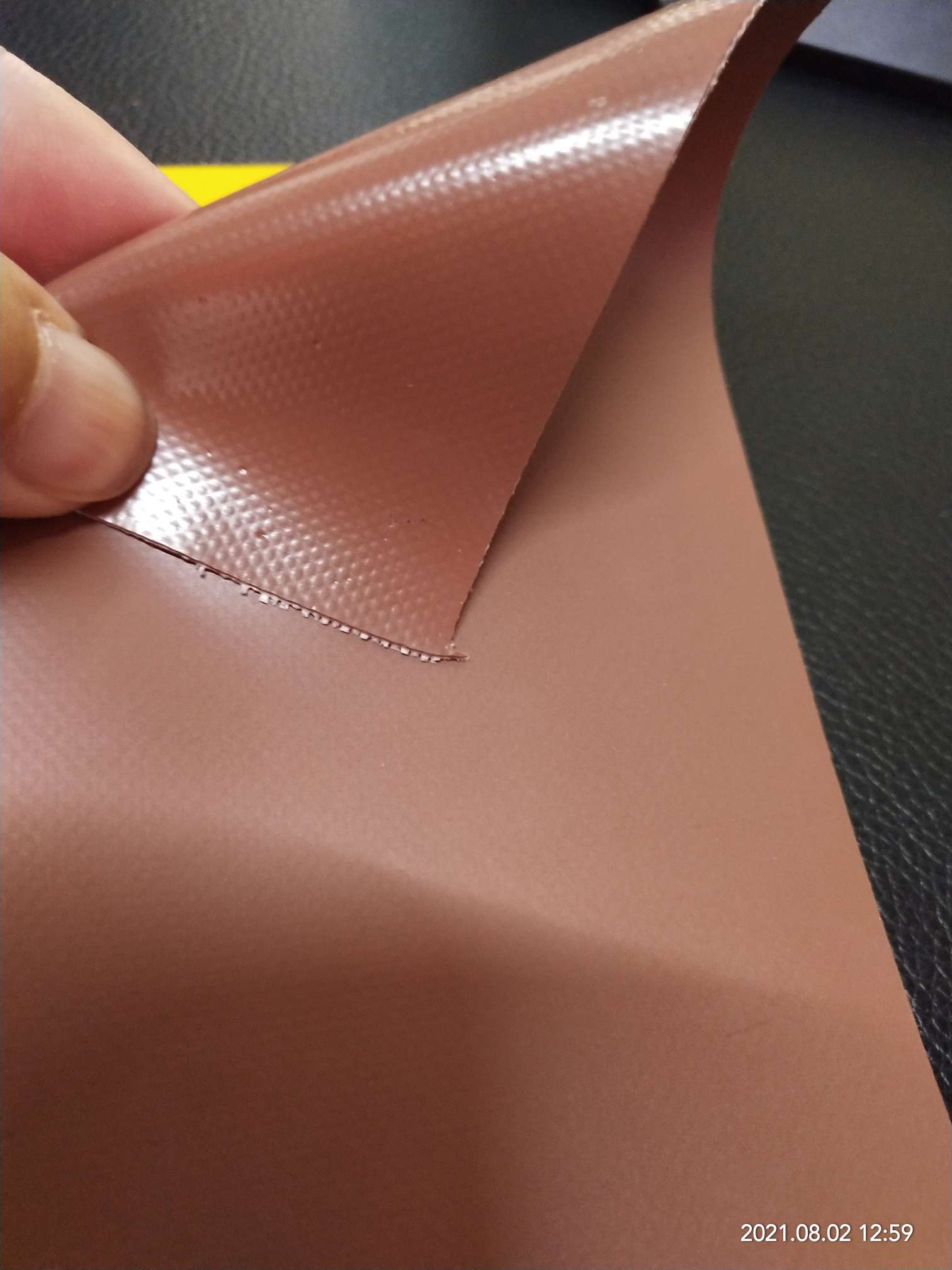 High-quality matte coffee-colored PVC mesh fabric for luggage is suitable for various types of roller shutters, tool bags and special fabric for bags Specification image