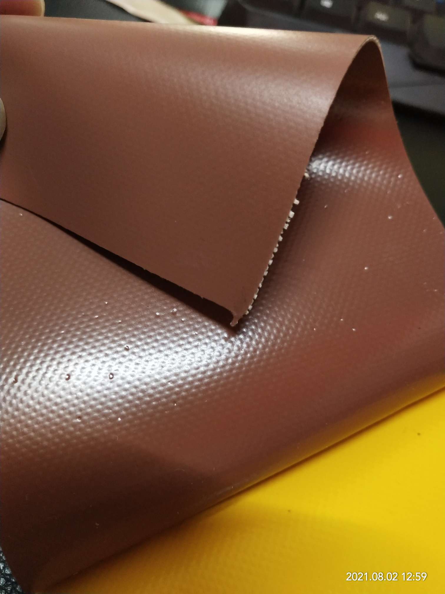 High-quality matte coffee-colored PVC mesh fabric for luggage is suitable for various types of roller shutters, tool bags and special fabric for bags detail image 4