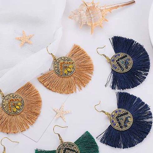 Semi-circular tassel ear hook
