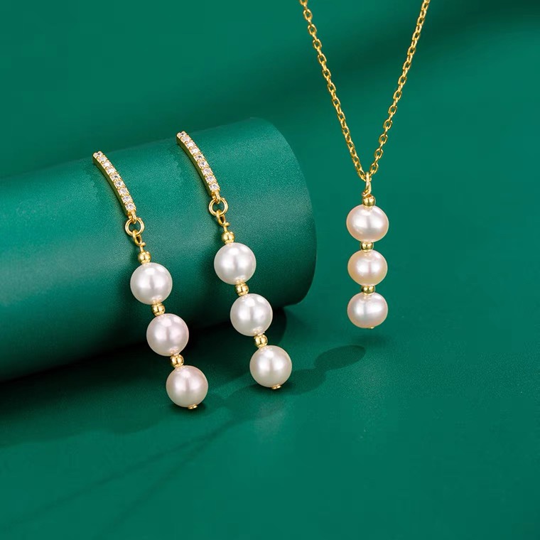 Three imitation pearl set