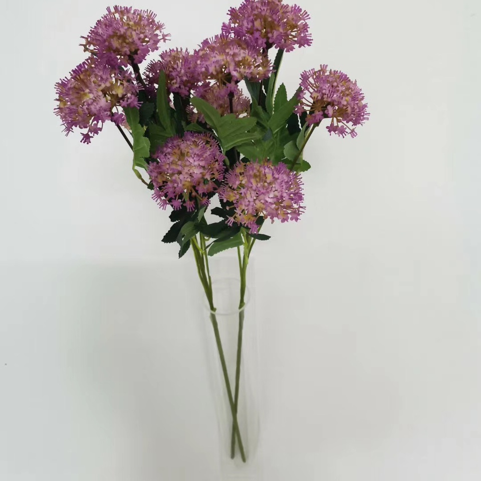 Five emerald pearls in light purple