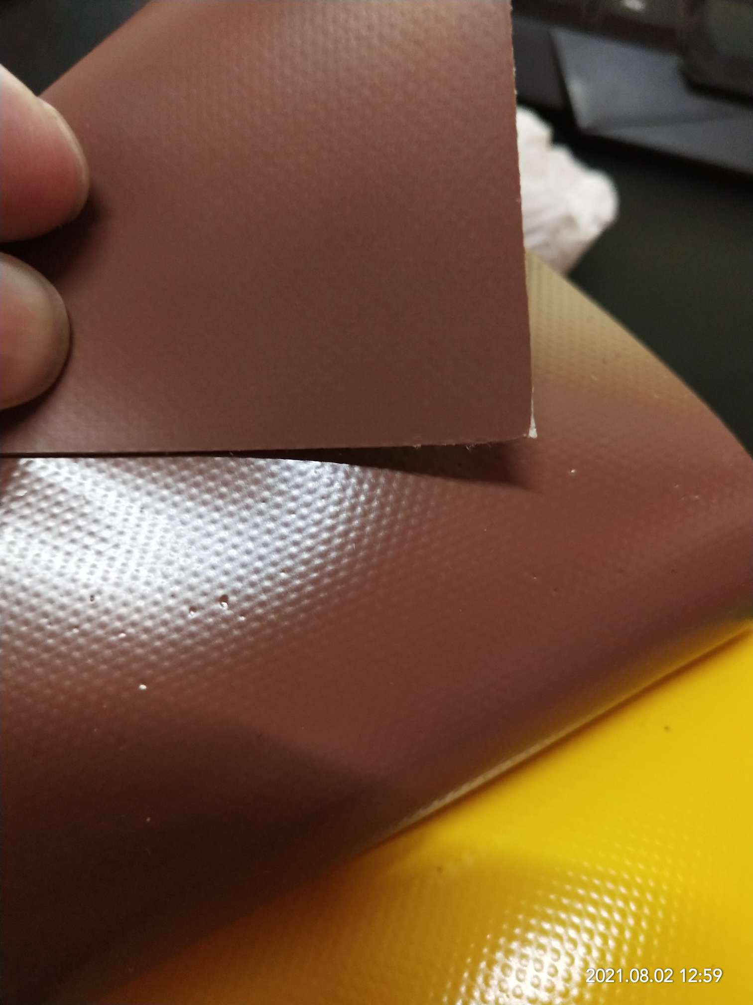 High-quality matte coffee-colored PVC mesh fabric for luggage is suitable for various types of roller shutters, tool bags and special fabric for bags detail image 2