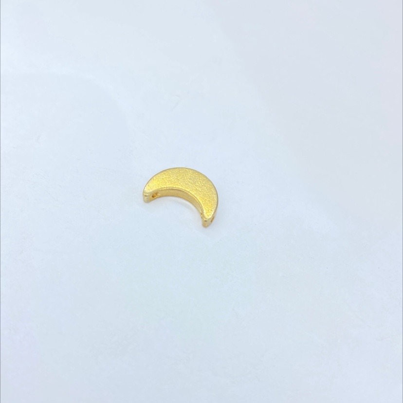 The moon has two holes in two planes