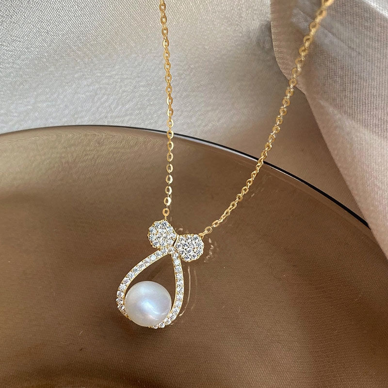 56 - Fashionable letter pearl necklace, light luxury, niche and high-end feel, collarbone chain, Korean temperament, cold style, Internet celebrity necklace for women