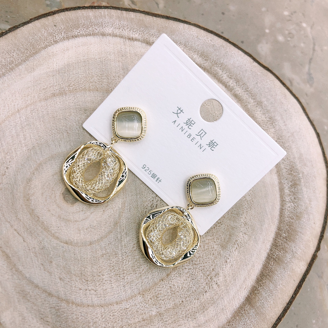 Elegant cat's eye stone crystal woven retro style trendy and individual women's earrings