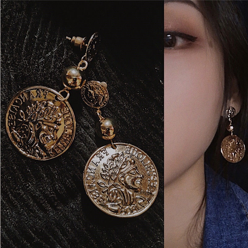 Simple Ins viento metal cabeza emotiva pendientes temperamento personalidad geométrica pieza redonda pendientes de oído exagerado largo orejeras mujer