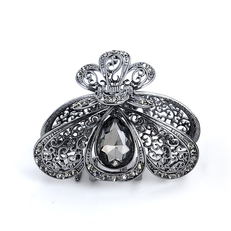 A black lady's hairpin with a teardrop-shaped hollowed-out grab, an Amazon alloy headpiece Specification image