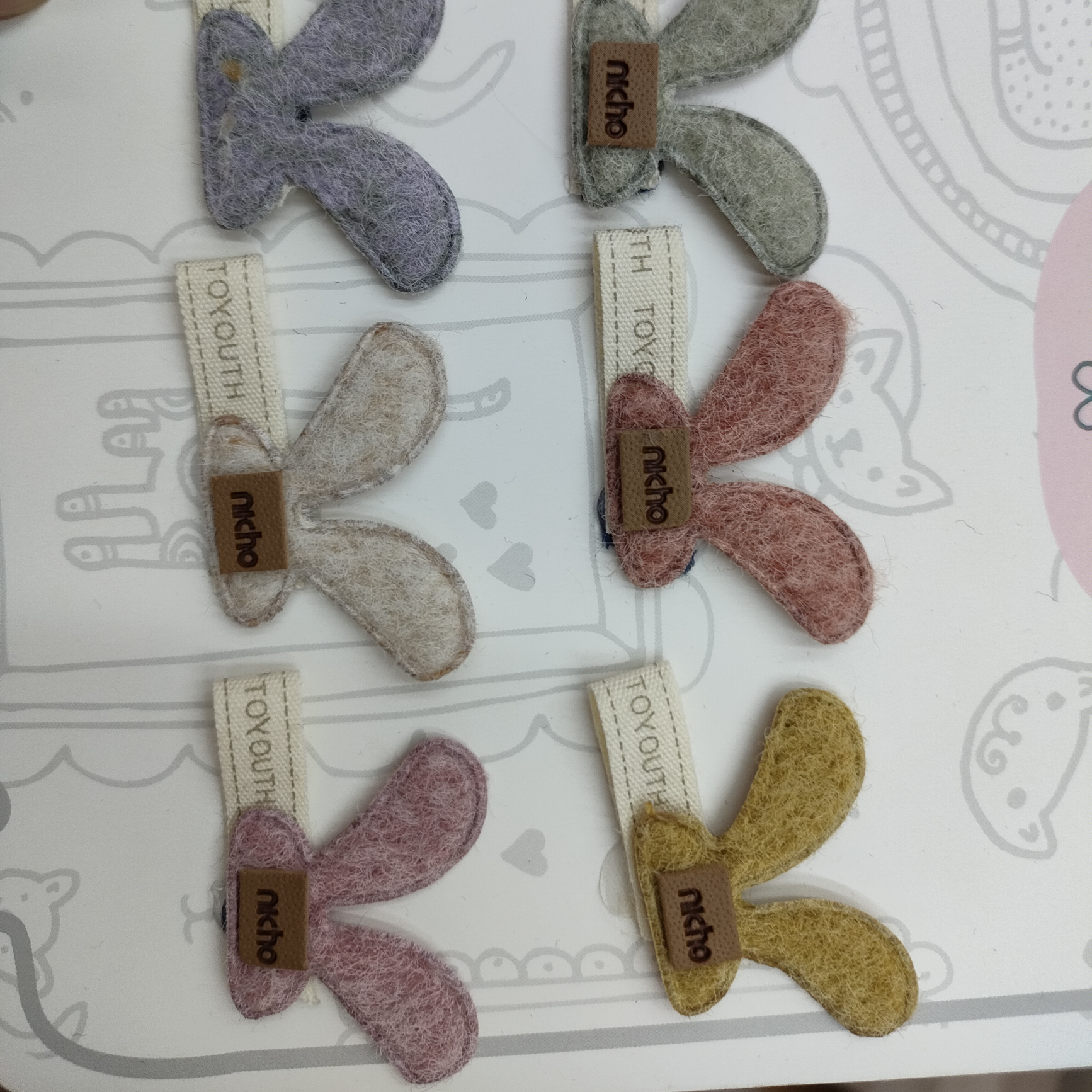 Webbing ear tags