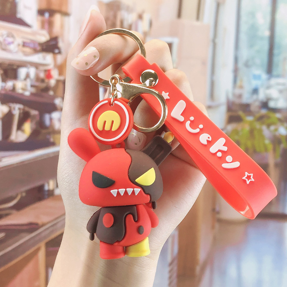 FLY724 new plastic PVC dinosaur lovers cute bag animation figure key chain pendant car key chain wholesale