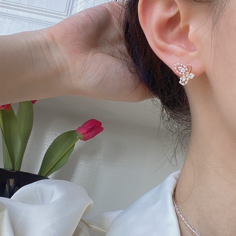 S925 Silver needle exquisite micro-inlaid gentle and sweet fairy style pearl zircon butterfly stud earrings for women Application Scenario