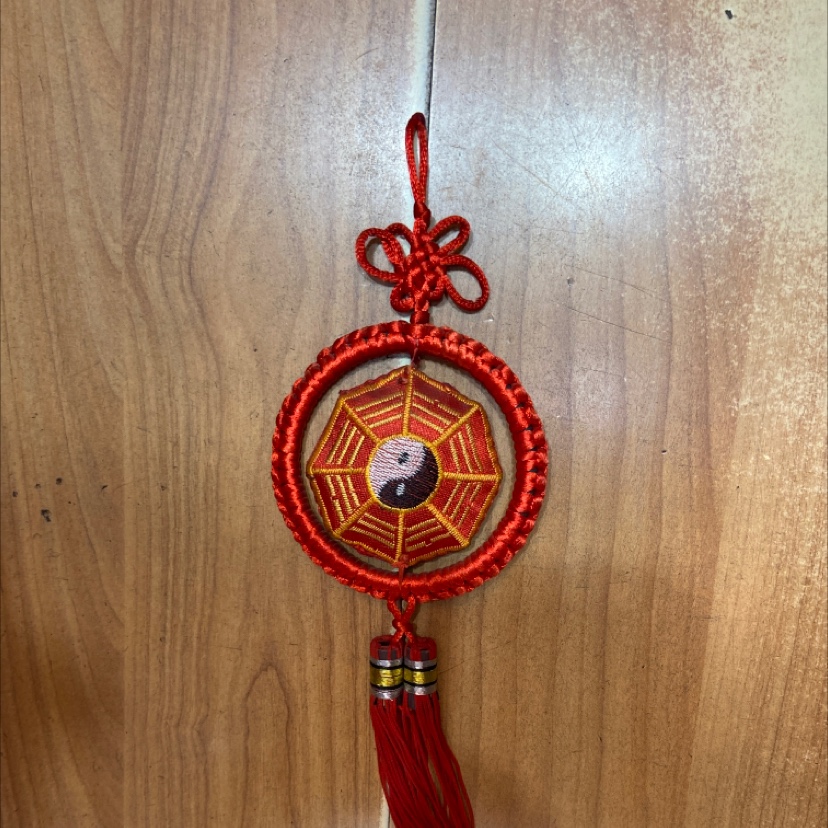 A red ring hanging eight-angle embroidered baguette
