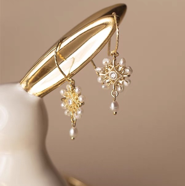 Paper-cut rice bead earrings