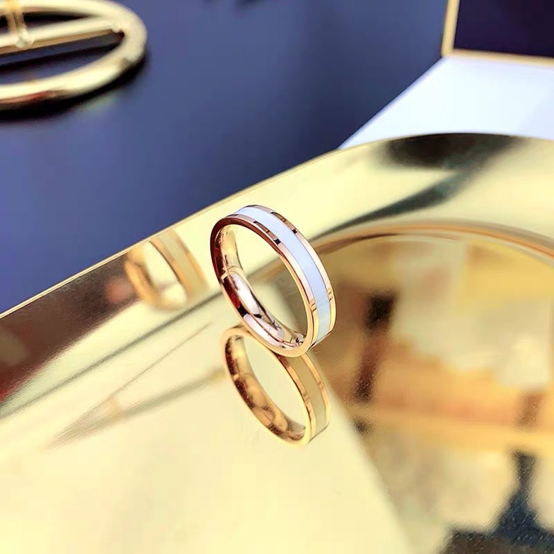 Korean-style trendy men's and women's index finger rings with oil dripping, black and white Jieya steel jewelry Specification image