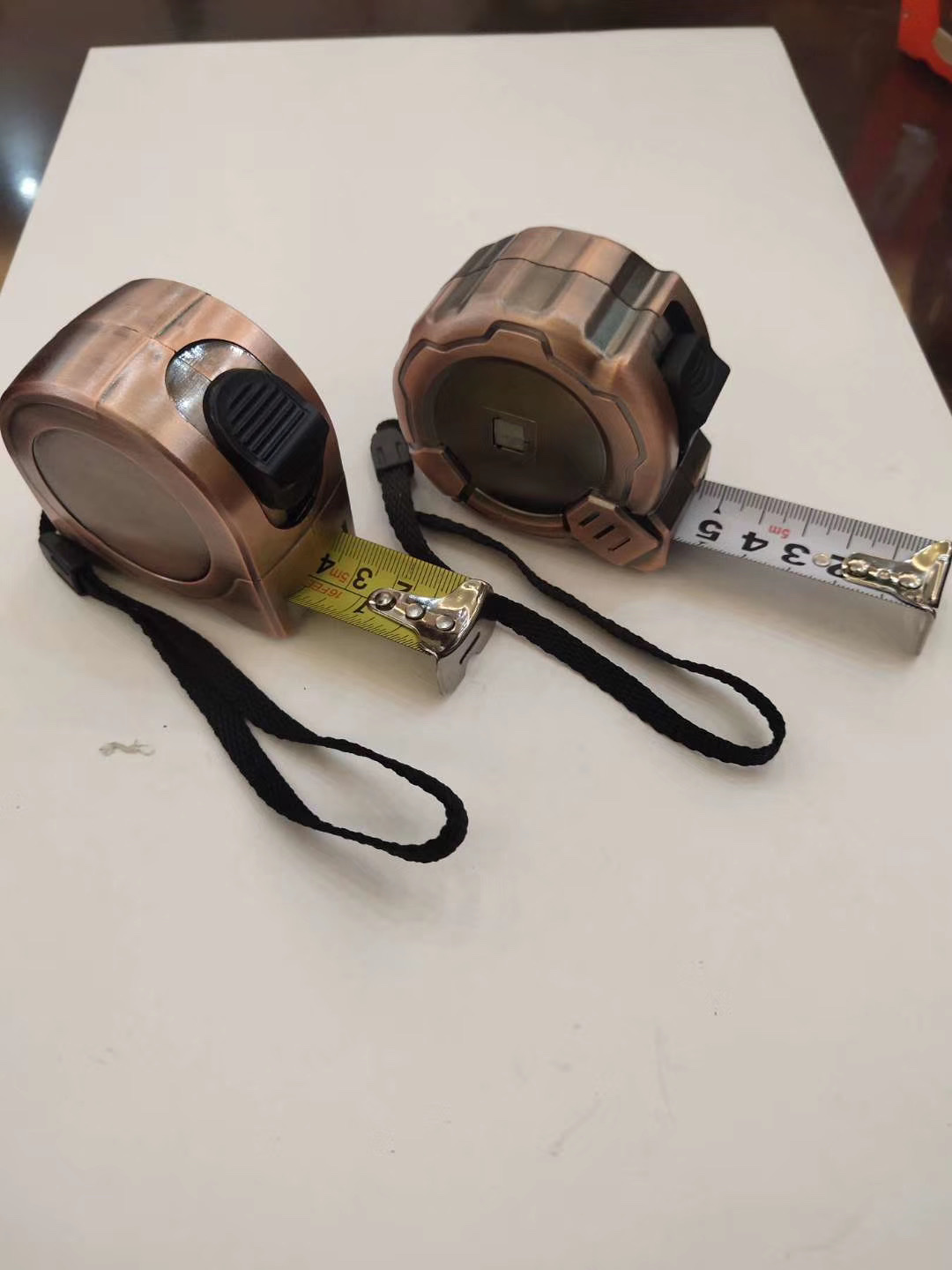 Copper-plated steel tape measure with iron core, factory direct sales, complete specifications of hardware tools, complete packaging Specification image