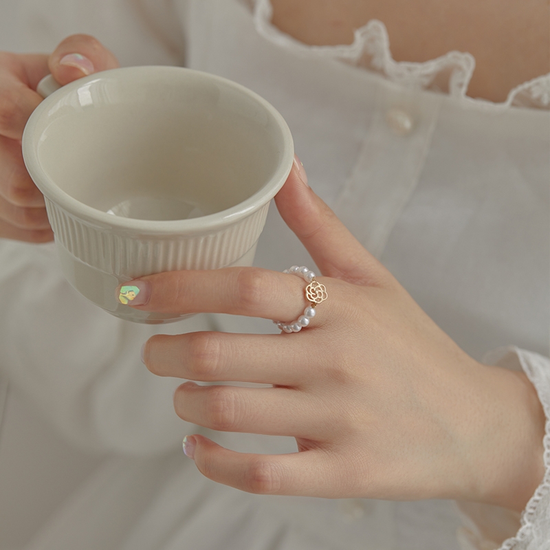 Two stacked pearl camellia ring sets, a simple forest-themed niche design for women's light luxury, stylish and versatile Application Scenario