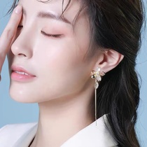 Floral su long earrings