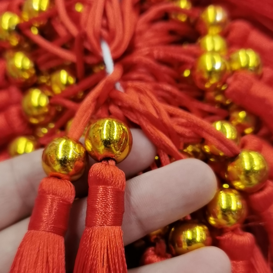Direct sales from the manufacturer of 7-mile tube with gold bead tassels