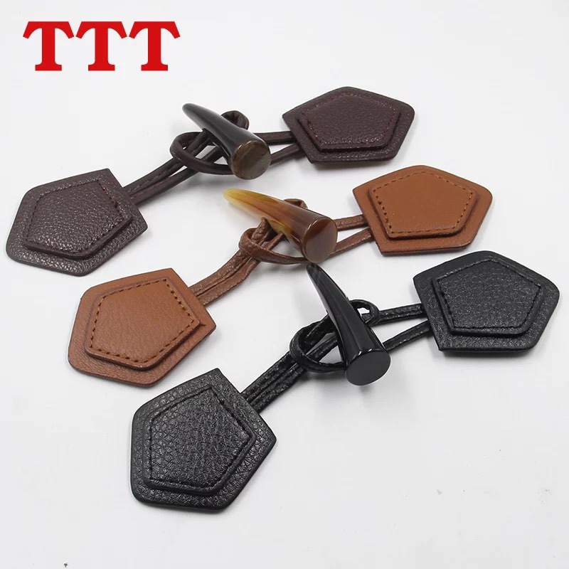 牛角纽扣子辅料黑色带皮大衣毛呢羊绒男女外套对扣皮条绳