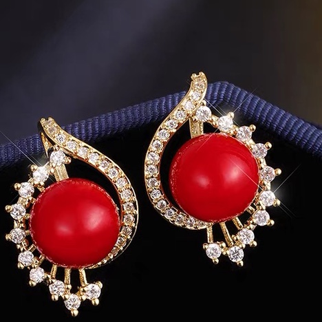 Red ball gear earrings
