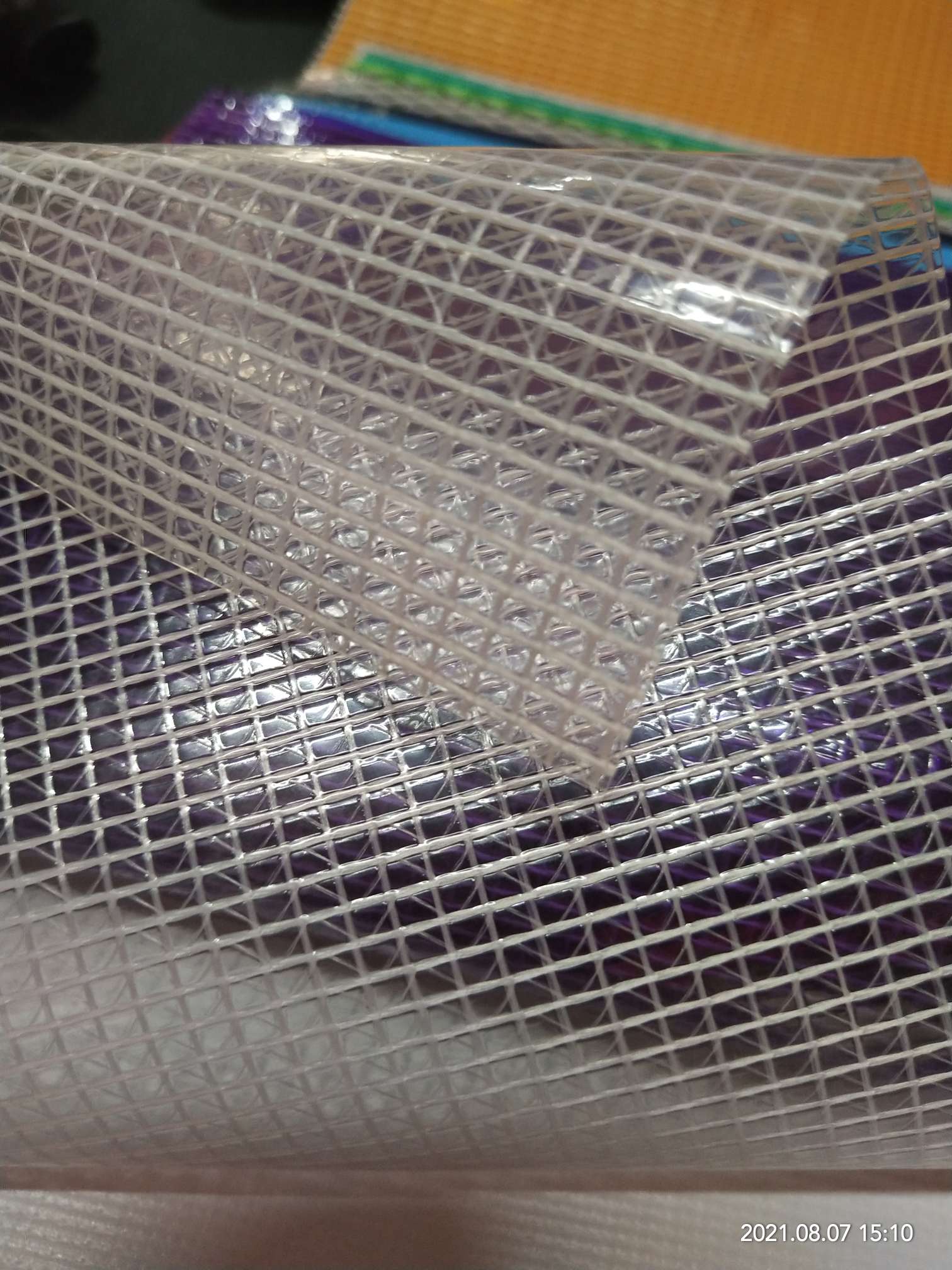 优质白色0.55mm厚透明PVC夹网布  适用于各种机器罩家具罩 文件袋 收纳箱 化妆包专用面料产品图