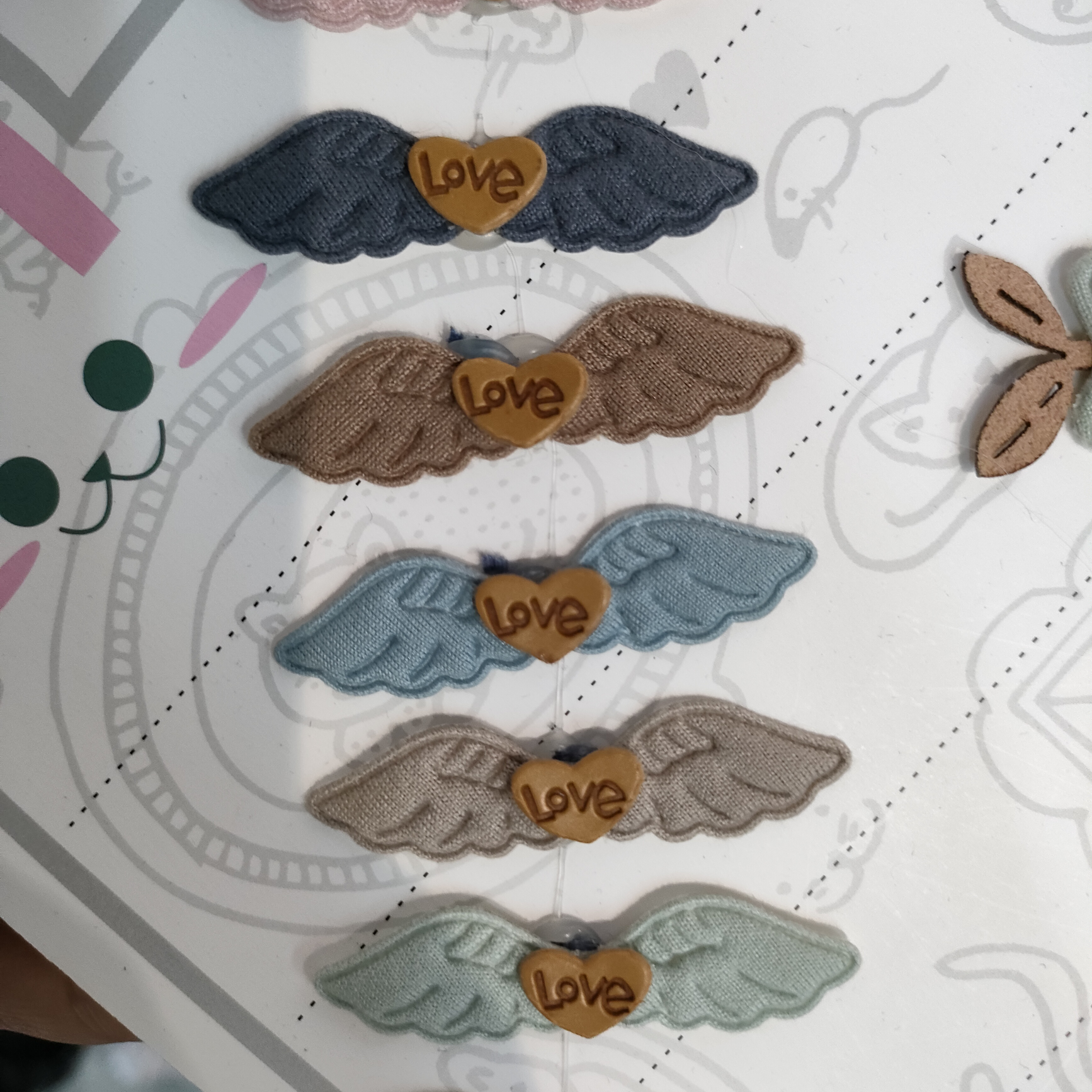 Wings with hearts