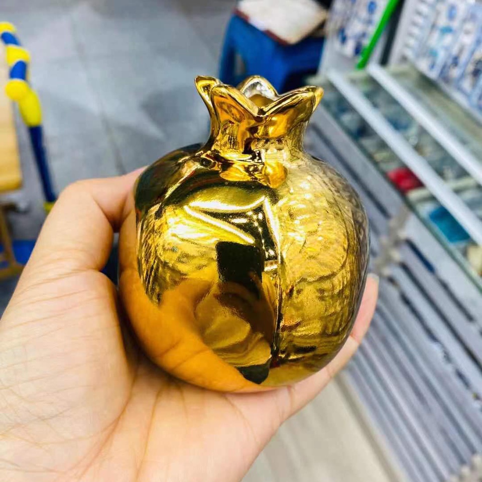 Golden pomegranate handicraft