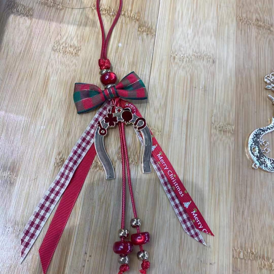 Checkered bow pendant